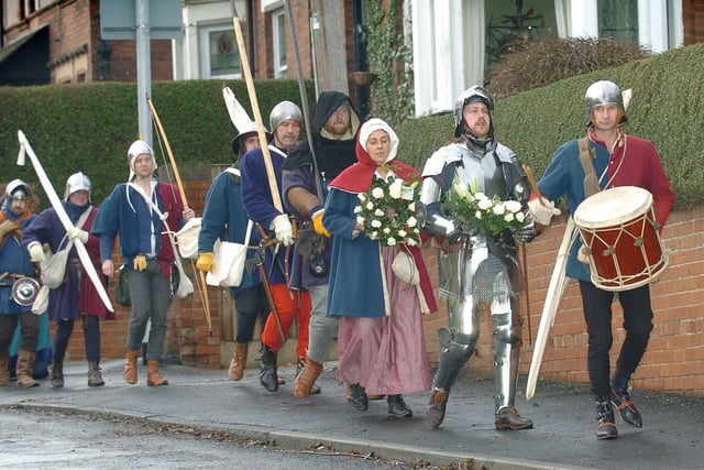In December 2005, volunteers from the Towton Battlefield Society the Company of Palm Sunday 1461 lay wreaths in memory of the Battle of Wakefield at Sandal Castle. Drummer Mick Doggett leads the way.