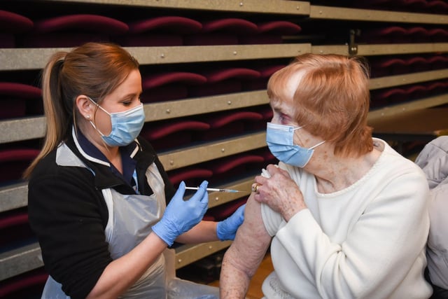 Practice nurse Dawn Taylor gives the vaccine to Esme Bridge, 83. Photo: Daniel Martino for JPI Media