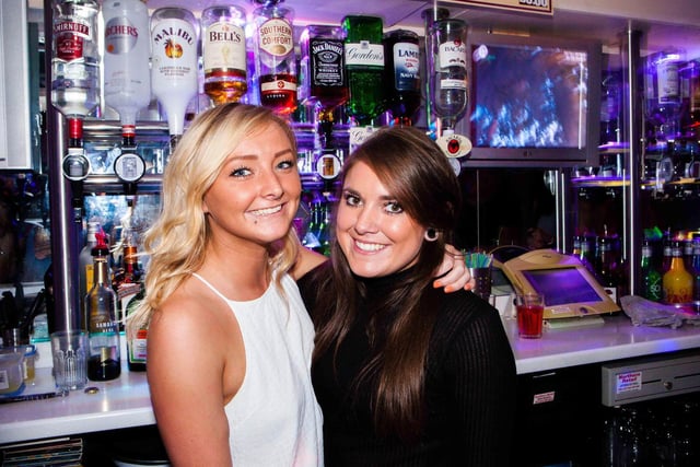 Megan and Hannah serving in Snowy's, in 2015.