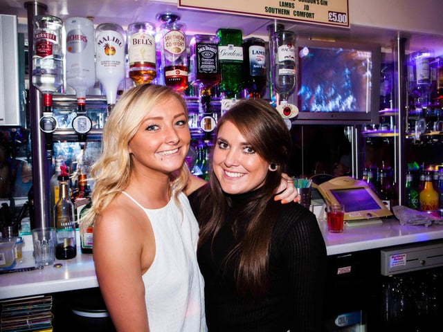 Megan and Hannah serving in Snowy's, in 2015.