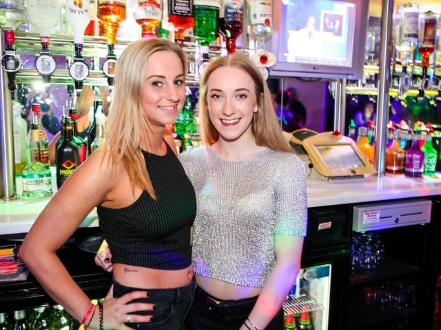 Pariss and Beth serving the punters, in 2016.