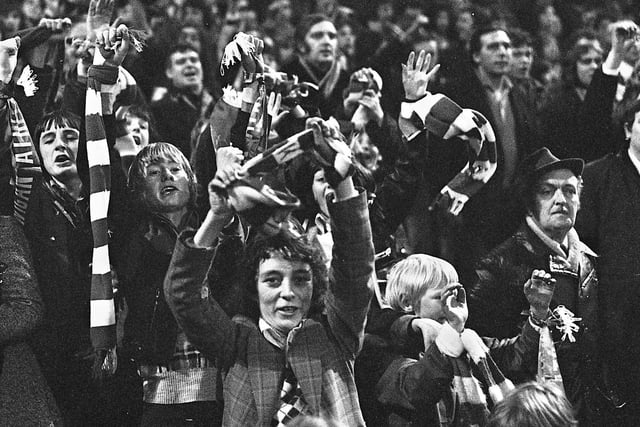Happy Wigan Athletic fans after their team's 1-1 draw against 4th Division Shrewsbury Town at Gay Meadow in the FA Cup 1st round match on Saturday 23rd of November 1974.