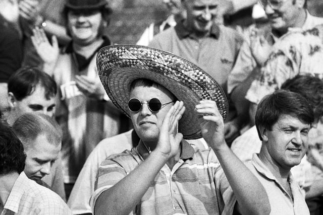 A Wigan Athletic fan wears a Sombrero in support of their Spanish players against Scunthorpe United in a Division 3 match at Springfield Park on Saturday 19th of August 1995.
Latics won 2-1 with goals from Jesus Seba and Chris Lightfoot.