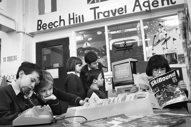 Pupils set up their own travel agency at Beech Hill Primary School on Tuesday 10th of March 1992.