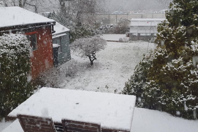 Snow has started settling in higher-up areas of Leeds, such as Cookridge.