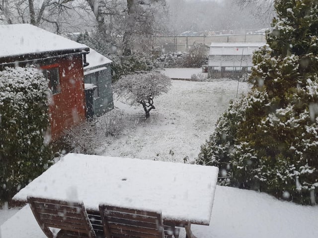 Snow has started settling in higher-up areas of Leeds, such as Cookridge.