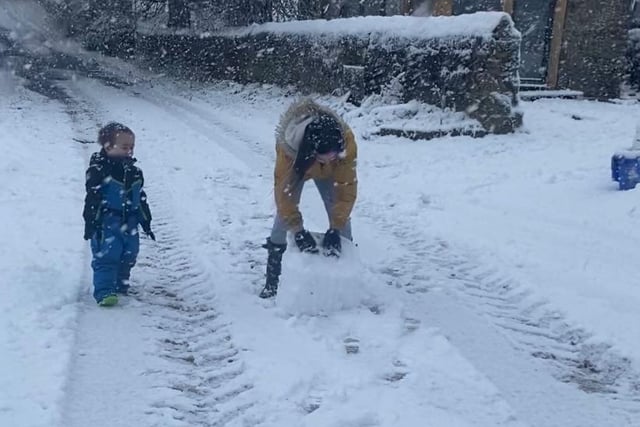 Gabrielle Hayton sent in this picture of three-year-old Ted building a snowman with Chloe, 11.