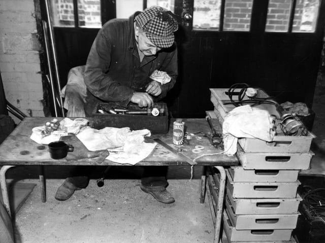 Brian Kershaw, curator of engineering from Leeds Museums and Galleries, working on a mill engine at Armley Mills in October 1986.. It had opened as Leeds Industrial Museum in 1982.