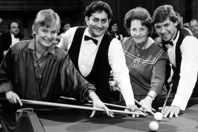 September 1986 and snooker superstars Joe Johnson and Tony Knowles join the cue queue with, on the left, Moira O'Donnell, matron of Wheatfields Hospice and  Lord Mayor of Leeds, Coun Rose Lund, at a Civic Hall charity tournament.