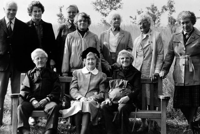September 1986 and Members of the Leeds Footpath Group of the Ramblers' Association make use of the bench they donated to Temple Newsam House, Leeds, in memory of Jack Madden, the group's chairman.