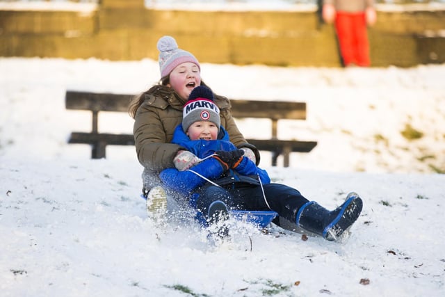 Lily Dodd and Jacob Dodd sledging at West View Park, Halifax.