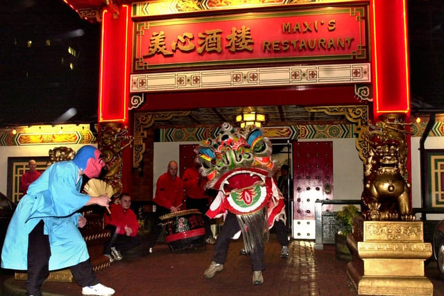 The Lion Dance being performed outside Maxi's Chinese restaurant on Bingley Street, Leeds to celebrate the Chinese Year of the Snake.