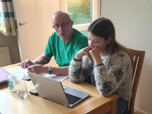 Melanie Sewell said: "My Granddaughter Megan and her Grandad. ICT Lesson re spreadsheets."