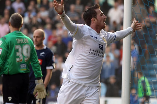 Ross McCormack celebrates scoring against Millwall at The Den in March 2012. The Whites won 1-0.