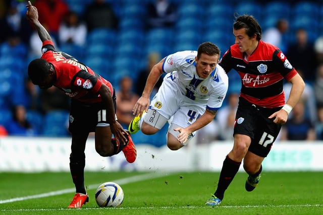 Ross McCormack battles with Joey Barton and Shaun Wright-Phillips during Leeds United's clash with QPR at Elland Road in August 2013. The Whites lost 1-0.