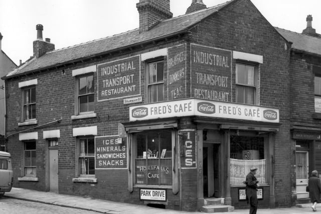 May 1965. The 'Industrial and Transport Restaurant' and Fred's cafe is the focus of this photo. Also pictured is Jean's Hairdressers, just seen on the right edge.