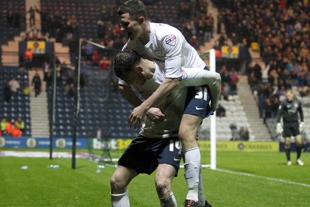 Alan Browne jumps on Joe Ganer's back in the 3-1 win over Peterborough in March 2014 - his PNE debut