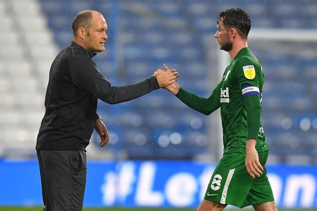 Alex Neil congratulates Alan Browne after his two goals at Huddersfield in October 2020