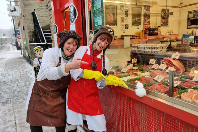 Custance Butchers in Brighouse build a small snowman. Picture by Steven Lord