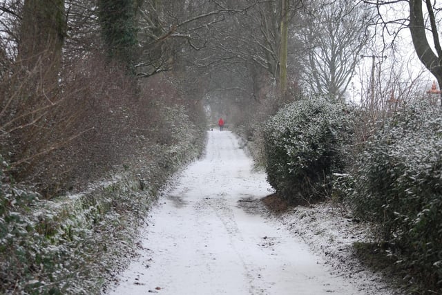 A sprinkling of snow on Coley Hall Lane by Mike Halliwell
