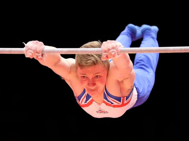 Nile Wilson competes on the High Bar during day six of World Artistic Gymnastics Championship at The SSE Hydro in October 2015