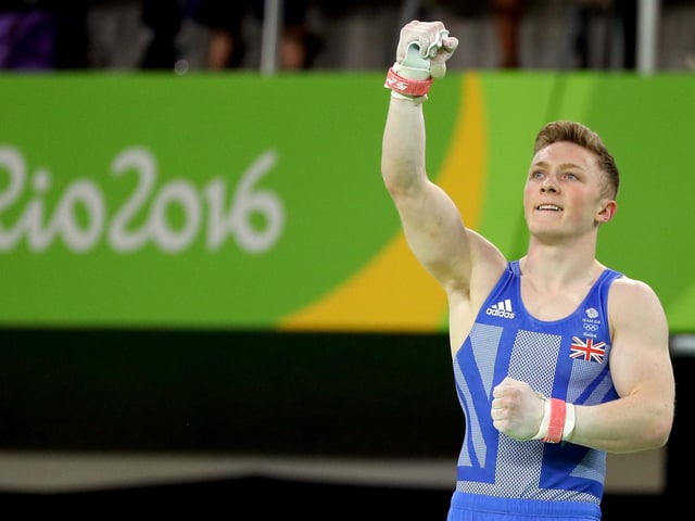 Nile Wilson reacts after he competes in the Horizontal Bar in the Artistic Gymnastics Men's Team qualification on Day 1 of the Rio 2016 Olympic Games.