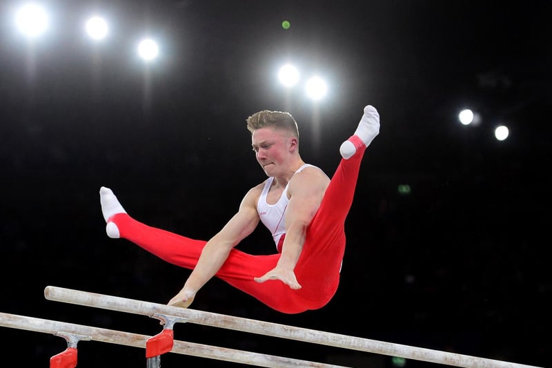 Nile Wilson performs on the parallel bars during the Team Final and Individual qualification of the Artistic Gymnastics event during the 2014 Commonwealth Games in Glasgow in July 2014.