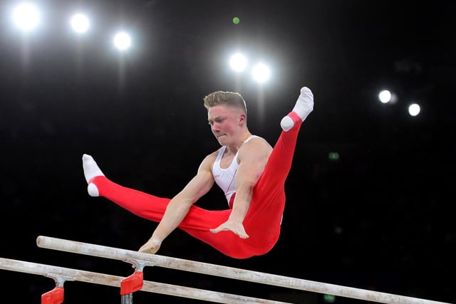 Nile Wilson performs on the parallel bars during the Team Final and Individual qualification of the Artistic Gymnastics event during the 2014 Commonwealth Games in Glasgow in July 2014.