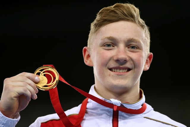 Gold medalist Nile Wilson poses during the medal ceremony for the Men's Horizontal Bar Final at SSE Hydro during day nine of the Glasgow 2014 Commonwealth Games in August 2014.