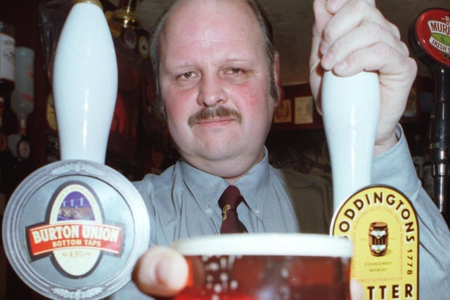 Longridge's Forrest Arms landlord, Bill Jay pulls one of his award winning pints after winning CAMERA's North West pub of the year.
