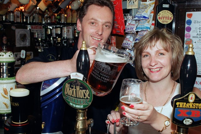 The landlord and landlady of the 1000 year old Black Horse pub at Limbrick at Chorley, Andrew and Tracey Edmundson with a guest beer specially named The Black Horse, to commemorate the occasion.