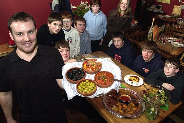 Restaurant owner Seb McGowan serves a business lunch to Lawnswood High School pupils at Viva Cuba in Kirkstall. The students were campaigning for an indoor skate park and recreation centre.