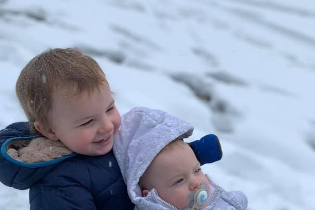 Heather Robinson sent in this picture of her 'snow babies' enjoying a day on their sledge.