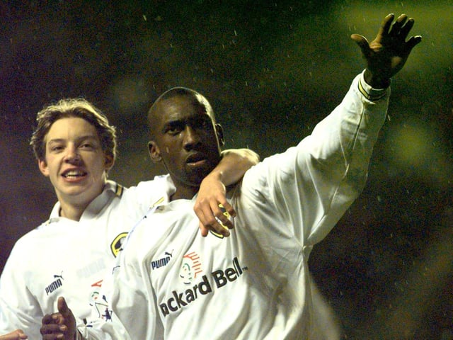 Jimmy Flotd Hasselbaink celebrates his goal with Alan Smith.