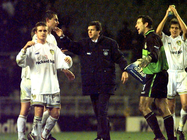 David O'Leary celebrates with his Leeds United team at full time.