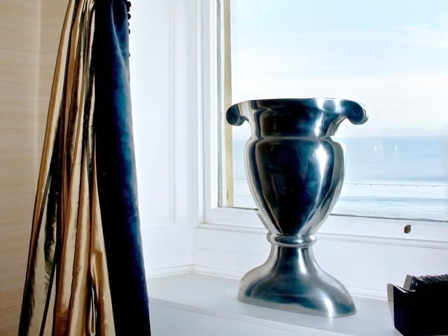 The windows provide stunning sea views