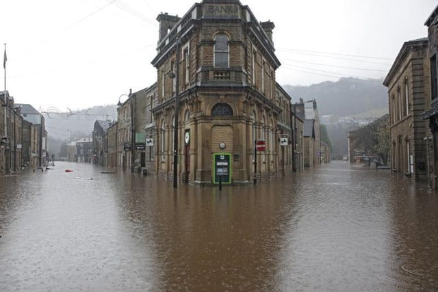 Boxing day 2015 flood in Hebden Bridge. Lloyds Bank an island in Albert Street.
More than 3,000 properties were flooded in the Calder Valley in West Yorkshire on December 26, 2015, causing an estimated £150m of damage.