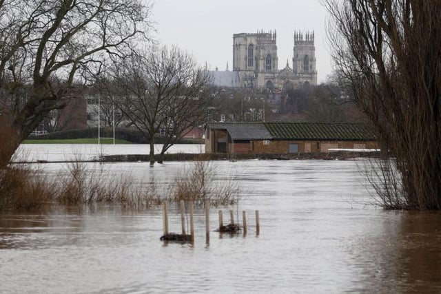 Homes were destroyed, businesses threatened and livelihoods put in danger following the Boxing Day floods in York 2015. 
Pictured is flood water in the city of York as York Minster is seen in the distance.