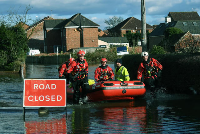 Homes were evacuated in Snaith after the River Aire flooded on February 25, 2020.
People forced to leave their properties and were encouraged to attend the local church for shelter and refreshments. Pictured are firefighters making their way down George Street.