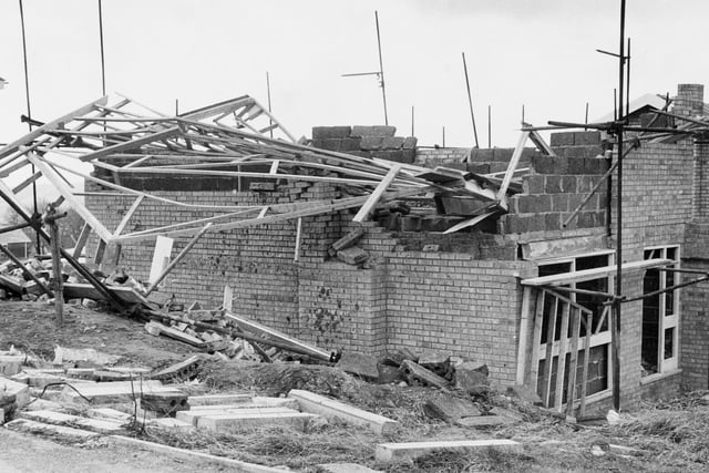 The same gales in November 1973 forced the roofing supports of this partly constructed new house to collapse.