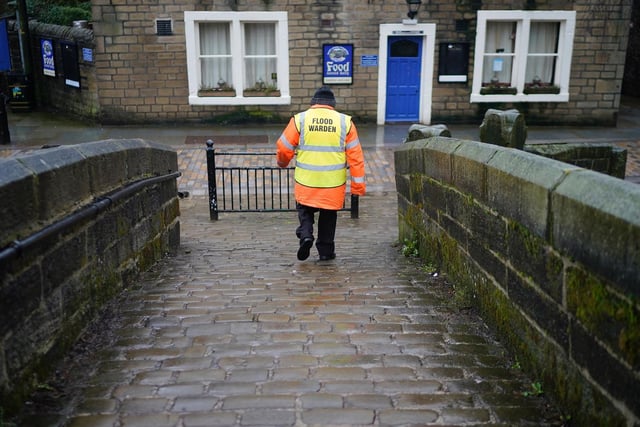 Volunteer flood warden Keith Crabtree MBE patrols the streets