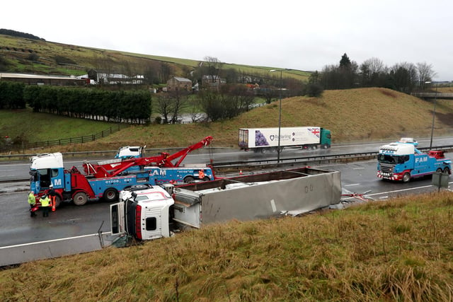 The lorry overturned across the hard shoulder and lane 1 which has caused large spillages of diesel to spread across the carriageaway according to Highways England (photo: PA Wire/ Danny Lawson)