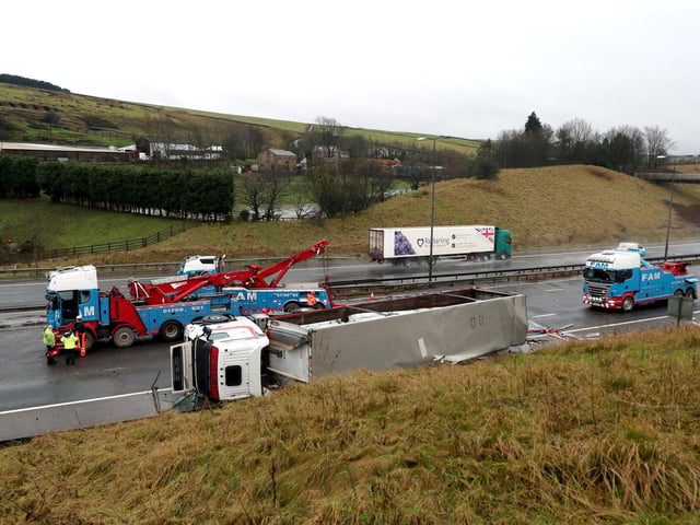 The lorry overturned across the hard shoulder and lane 1 which has caused large spillages of diesel to spread across the carriageaway according to Highways England (photo: PA Wire/ Danny Lawson)