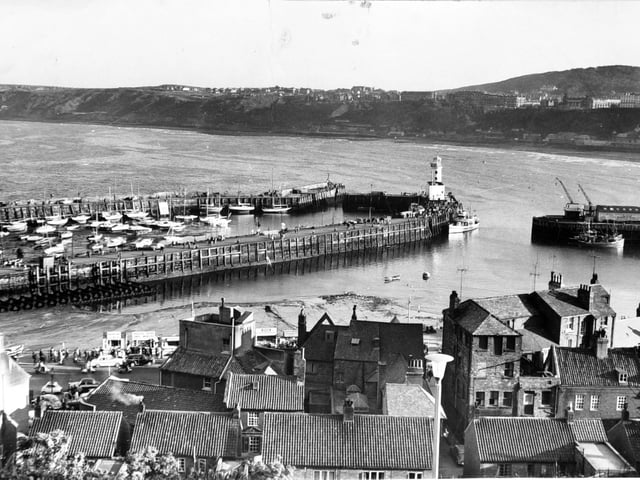 Panormaic view over the tiled rooftops of Scarborough harbour front in 1963.