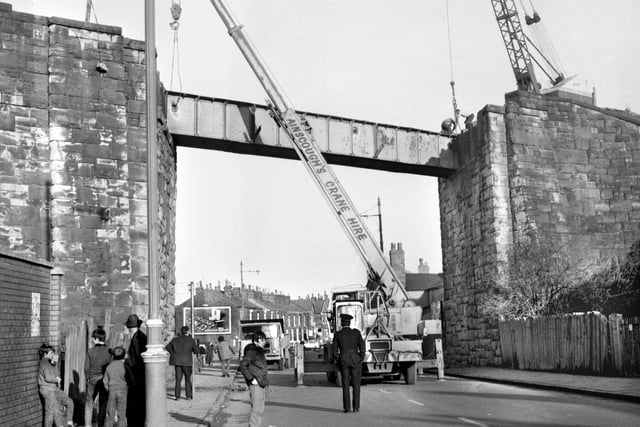 January 1971 - The demolition of the century old Tippings railway bridge on Poolstock Lane.  The bridge carried the old Pemberton loop line.