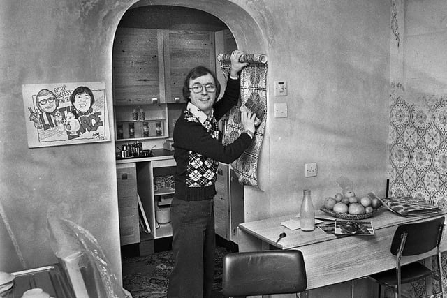 Comedian Syd Little, one half of comedy duo Little and Large, decorating his new house in Atherton in January 1977.