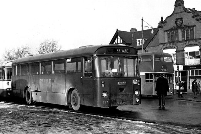 1970 - Pictured at the bus terminus on Wigan Market Square.
A winter of discontent for Ribble bus drivers as they stage industrial action in Wigan during January 1970.