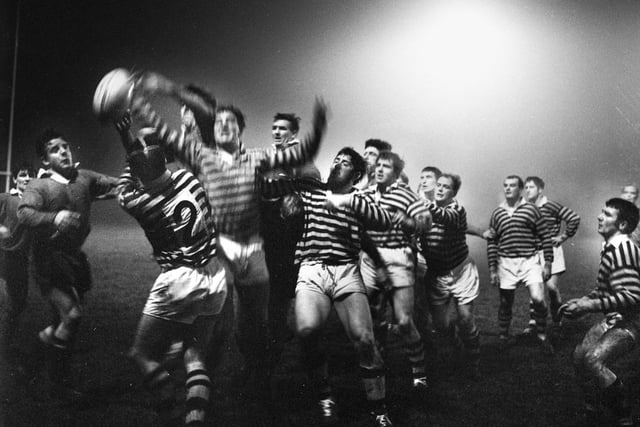 Action from the first match under Orrell Rugby Union Club's new floodlights in 1968. They were the first club in Lancashire to erect floodlights.