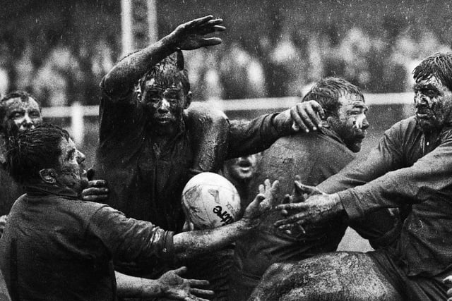 Muddy hell for Bob Kimmins on the right and fellow contenders in a line-out during a Courage League Division 1 match against Gloucester at Edge Hall Road on a stormy afternoon on Saturday 19th of March 1988.  Orrell lost 9-13.