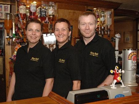 from left, Landlady Stephanie Lyons, head barmaid Pam Prior and landlord Stephen Dartnell at The Blue Bell Inn, Downall Green.